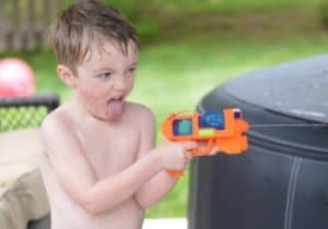 Squirt gun summer activity for preschoolers and toddlers