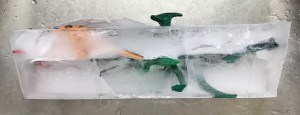 Dinosaurs frozen in ice side view